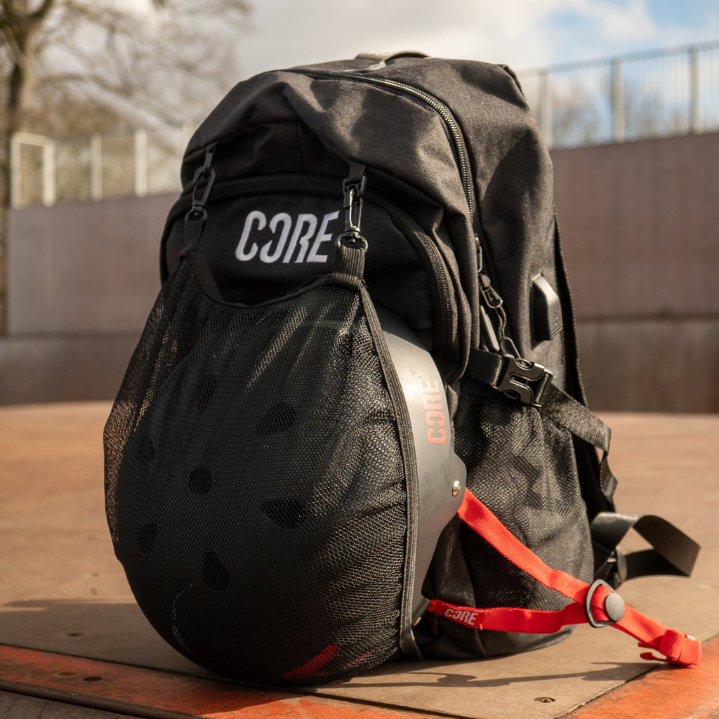 Core-Helmet-Backpack-Black-Helmet-In-Bag-Outdoors