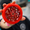 Core-Hex-Hollow-Stunt-Scooter-Wheel-110mm-Red-In-Hand-Close-Up