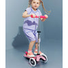Micro-Mini-Deluxe-Glow-PLUS-3-Wheel-Scooter-In-Use