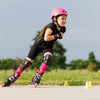 Rollerblade-Microblade-Junior-Adjustable_-Inline-Skate-Black-Pink-Lifestyle-View-1
