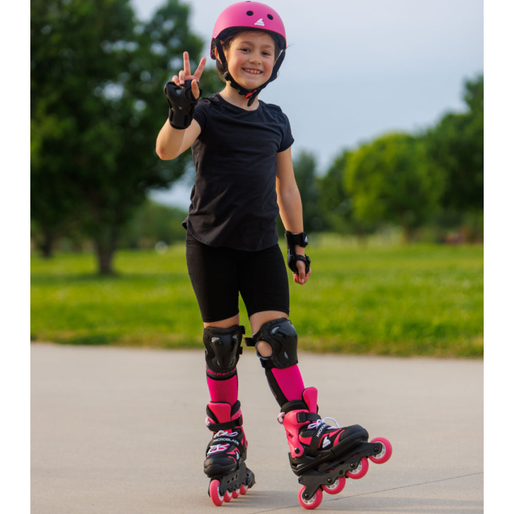 Rollerblade-Microblade-Junior-Adjustable_-Inline-Skate-Black-Pink-Lifestyle-View